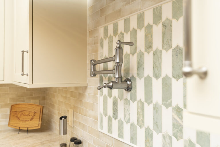 Haverford kitchen close up of pot filler and tile work